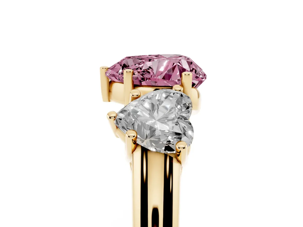 Fancy Pink Three-Stone Heart Cut Diamond Engagement Ring with Prong Setting Yellow gold