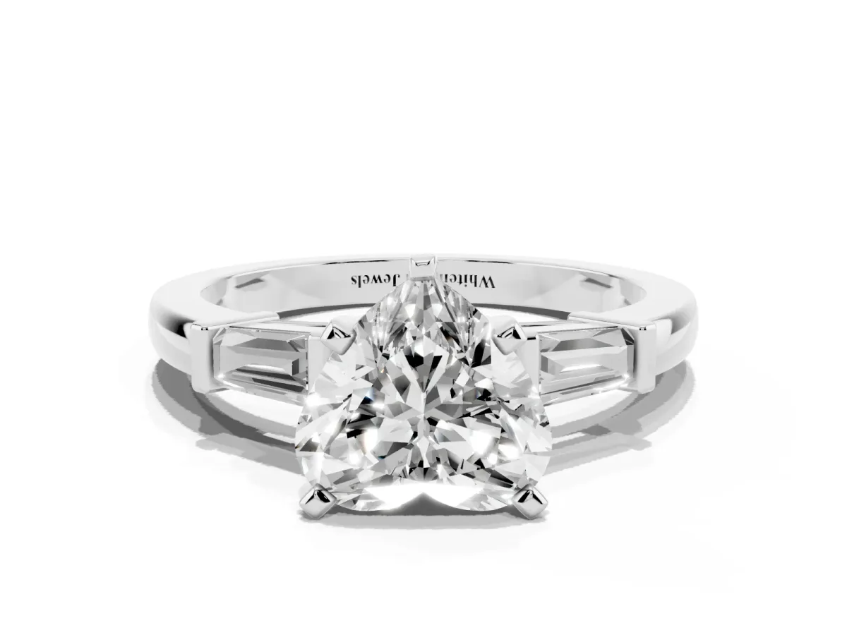 Heart Cut Cut Diamond Solitaire Ring with Tapered Baguette Accents and Four-Prong Setting White gold