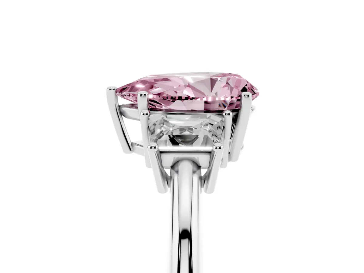 Fancy Pink Pear Cut Diamond Three-Stone Ring with Trapezoid Side Stones and Prong Setting Platinum