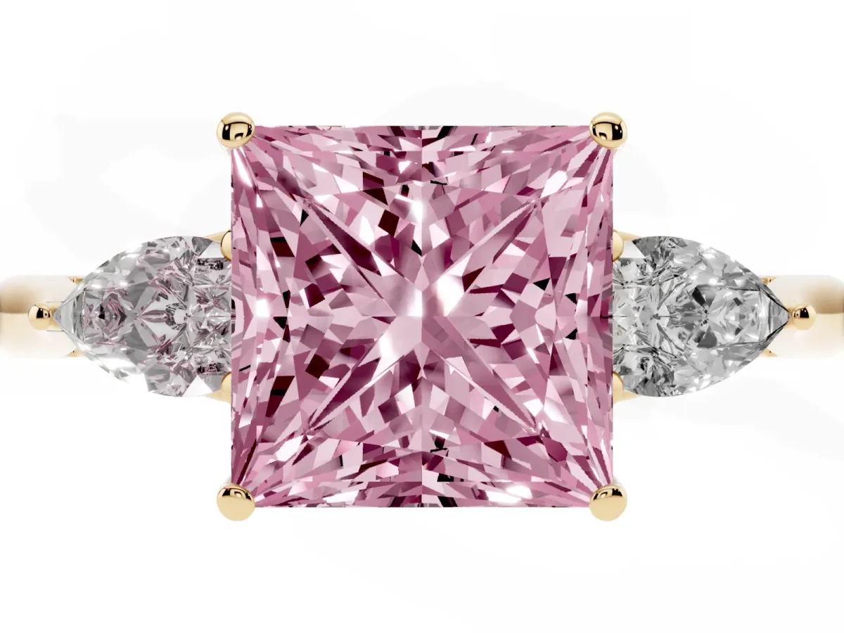 Fancy Pink Three-Stone Princess Cut Brilliant Diamond Solitaire Ring with Tapered Band and Four-Prong Setting Yellow gold