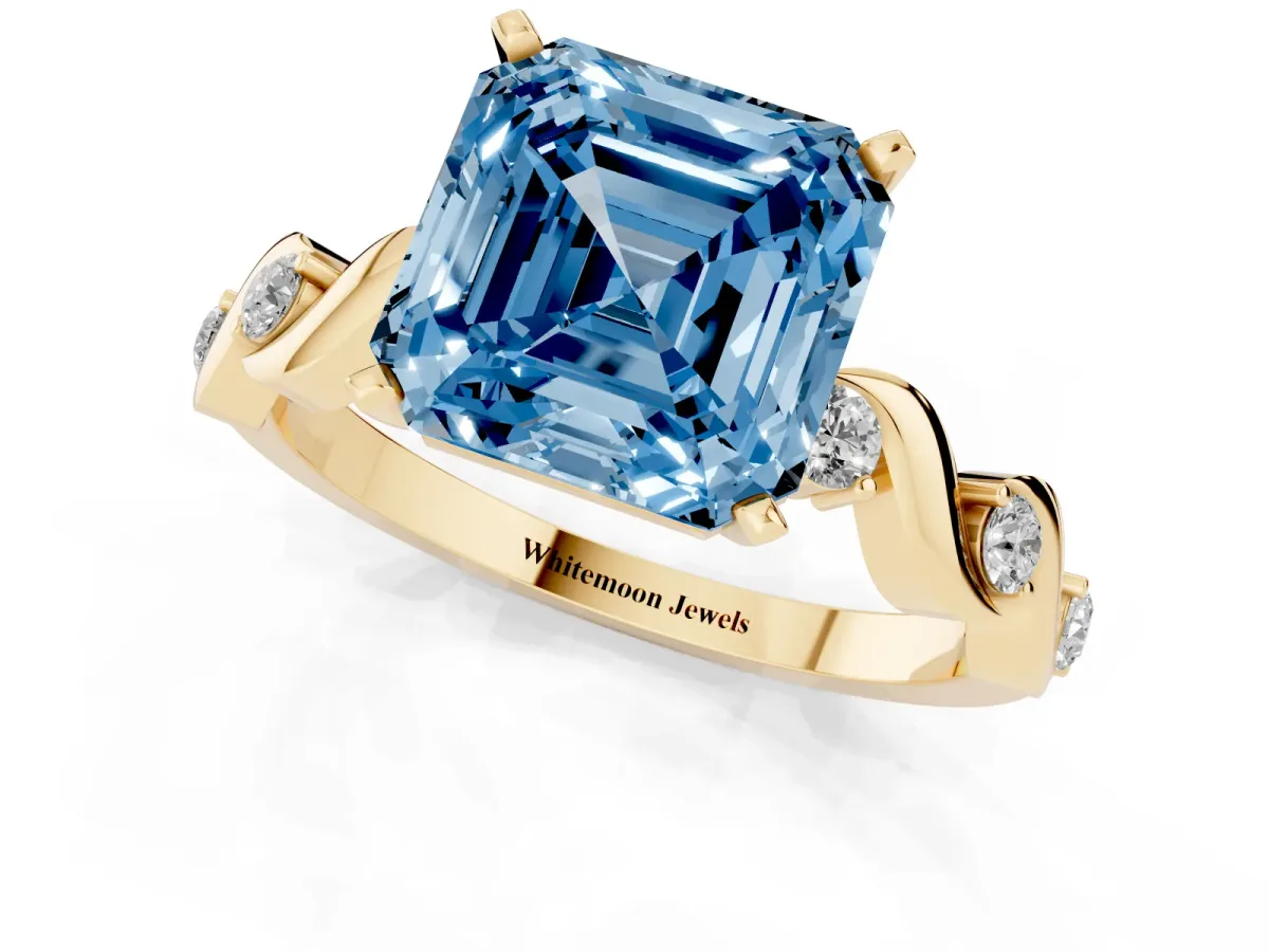 Fancy Blue Asscher Cut Diamond Solitaire Twisted Band with Round Accents and Prong Setting Yellow gold