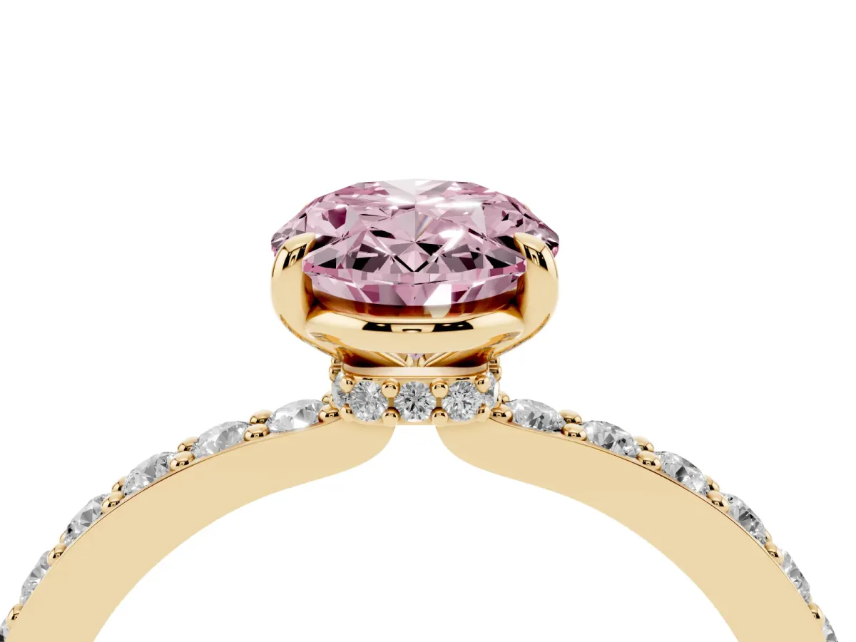 Fancy Pink Oval Cut Diamond Pavé Engagement Ring with Round Accents and Prong Setting Yellow gold