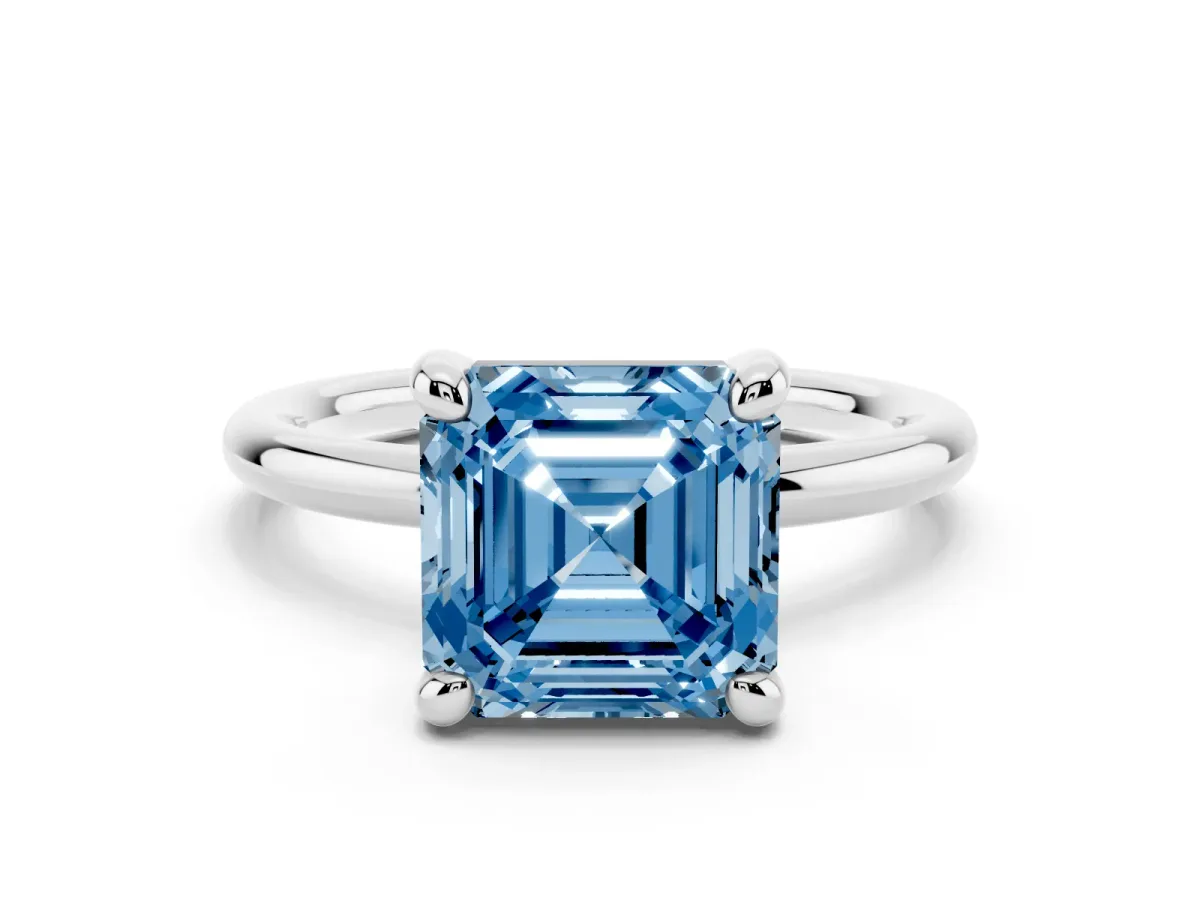 Fancy Blue Asscher Cut Solitaire Diamond Ring with Four-Prong Setting on a Plain Band Platinum