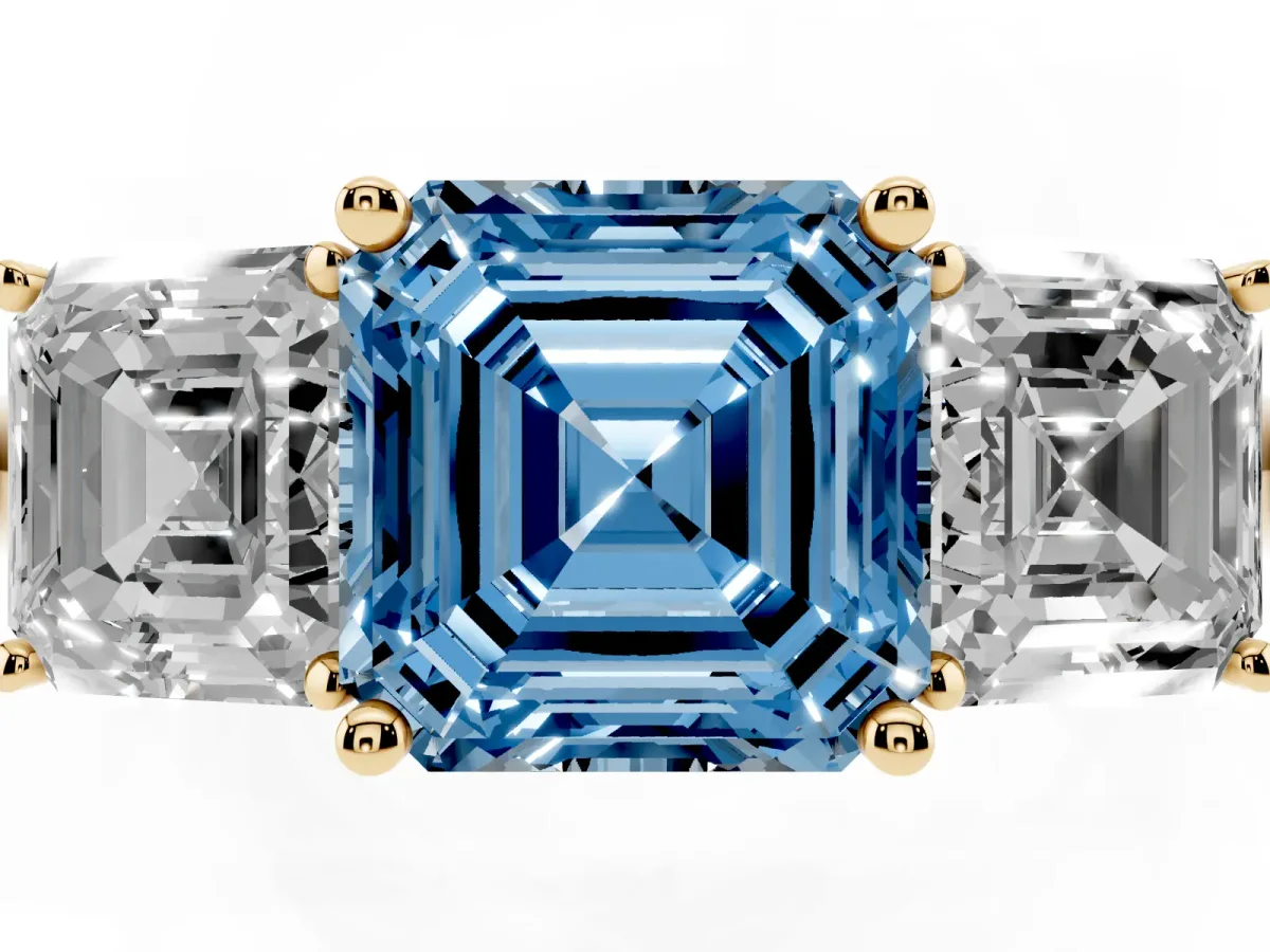 Fancy Blue Three-Stone Asscher Cut Cut Diamond Engagement Ring with Prong Setting on a White Gold Band Yellow gold