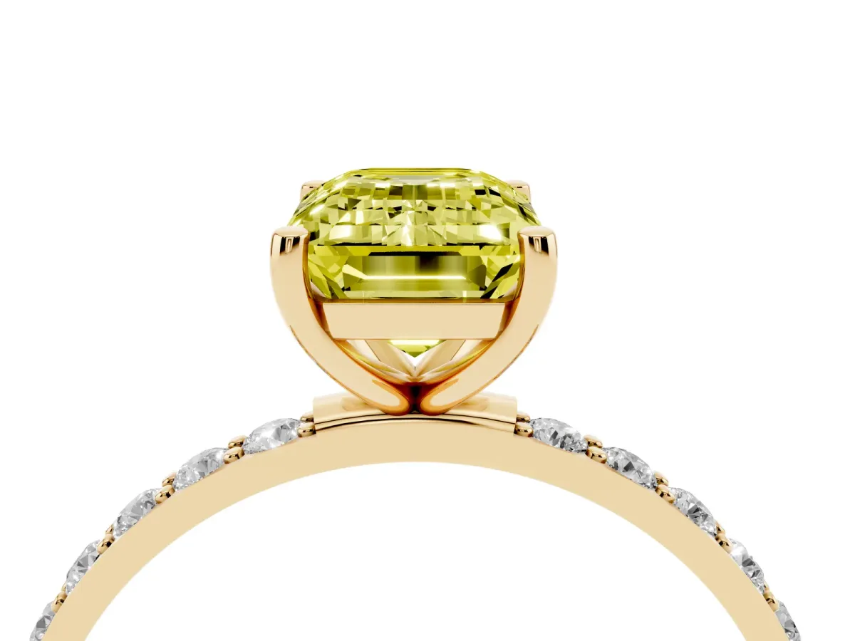Fancy Yellow Emerald Cut Diamond Solitaire Ring with Round Pavé Shoulders and Prong Setting Yellow gold