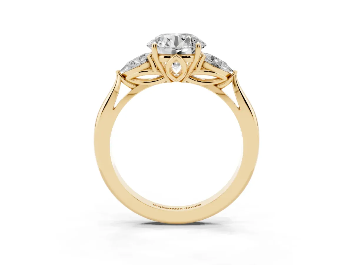 Three-Stone Round Cut Brilliant Diamond Solitaire Ring with Tapered Band and Four-Prong Setting Yellow gold