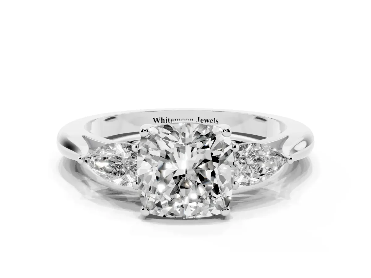 Cushion Cut Diamond Three-Stone Ring with Pear Side Stones and Prong Setting Platinum