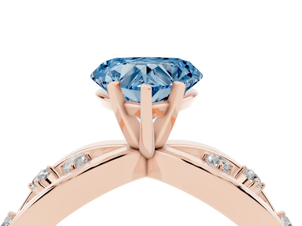 Fancy Blue Heart Cut Cut Solitaire Diamond with Side Stones on Criss-Cross Band and Four-Prong Setting Rose gold