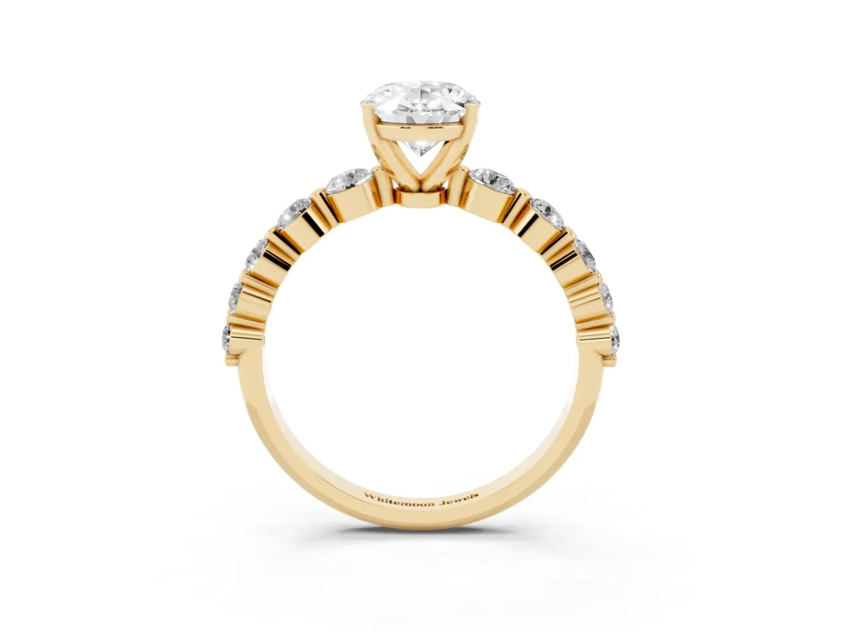 Oval Cut Solitaire Diamond Ring with Pave Band and Four-Prong Setting Yellow gold