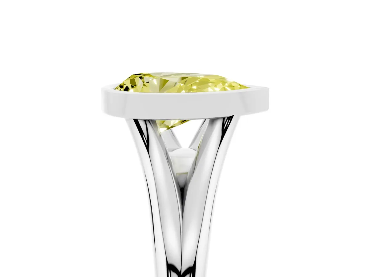 Fancy Yellow Bezel Set Pear Cut Cut Solitaire Ring with Tapered Band Silver