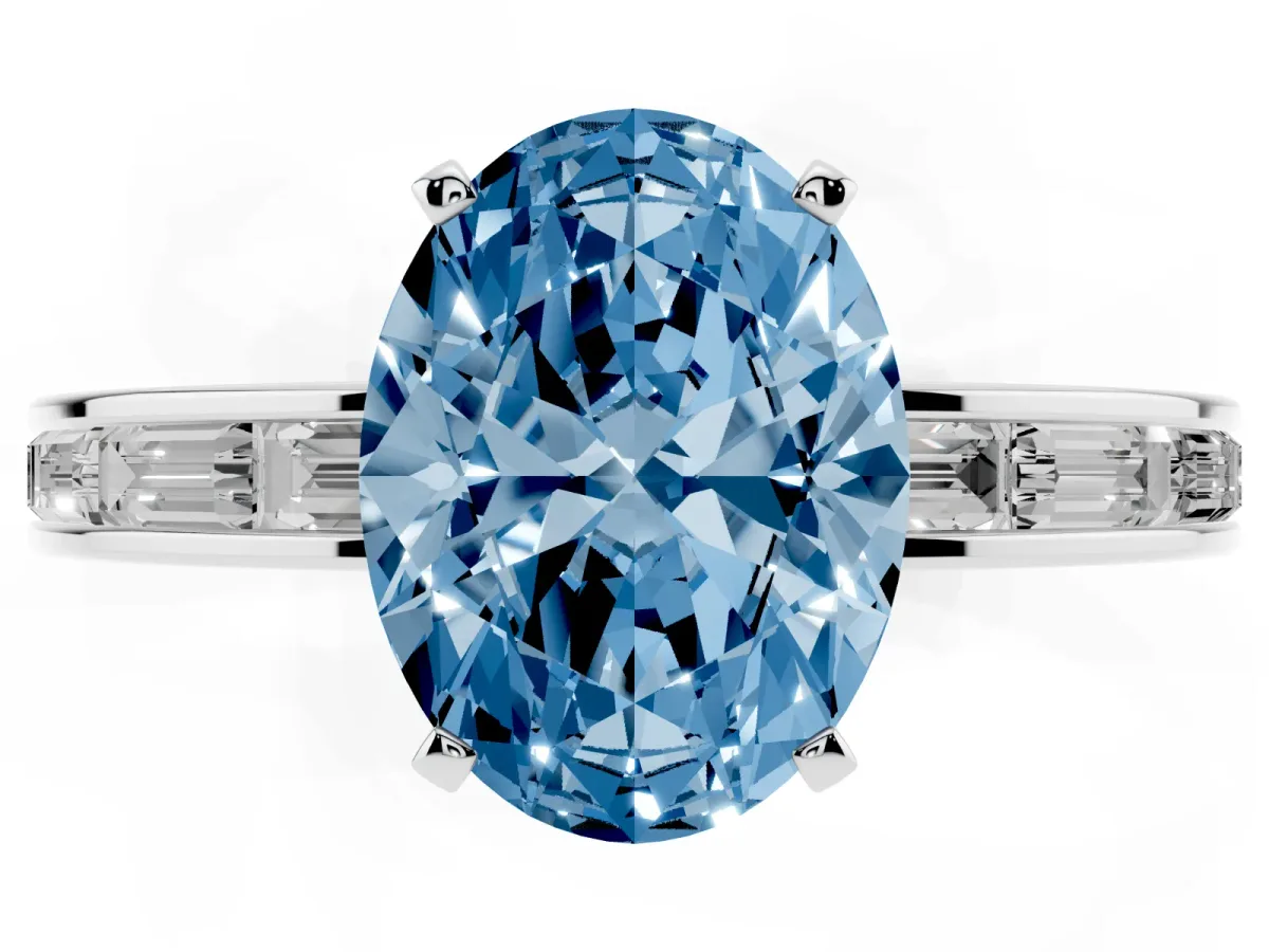 Fancy Blue Oval Cut Solitaire Diamond Ring with Channel-Set Baguette Band and Four-Prong Setting White gold
