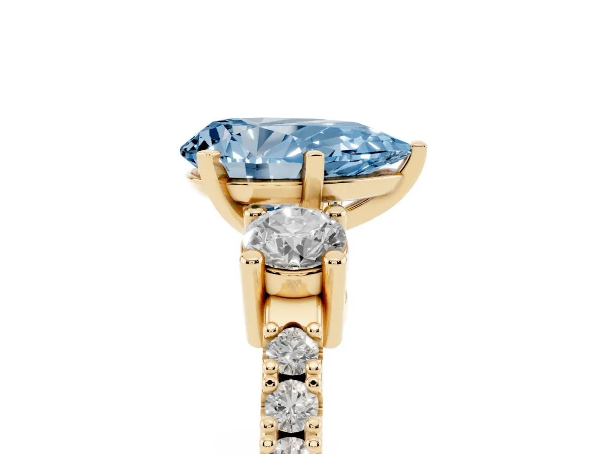 Fancy Blue Pear Cut Three-Stone Diamond Pavé Band with Prong Setting Yellow gold