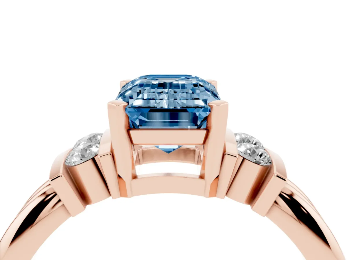 Fancy Blue Emerald Cut Cut Three-Stone Channel Set Ring with Bar Prongs Rose gold