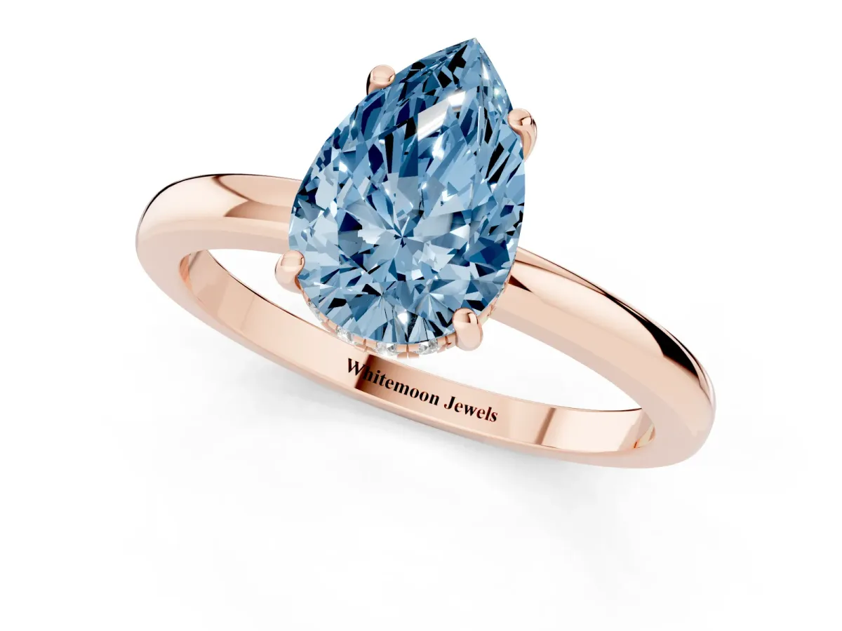 Fancy Blue Pear Cut Solitaire Diamond Ring with Prong Setting and Plain Band Rose gold