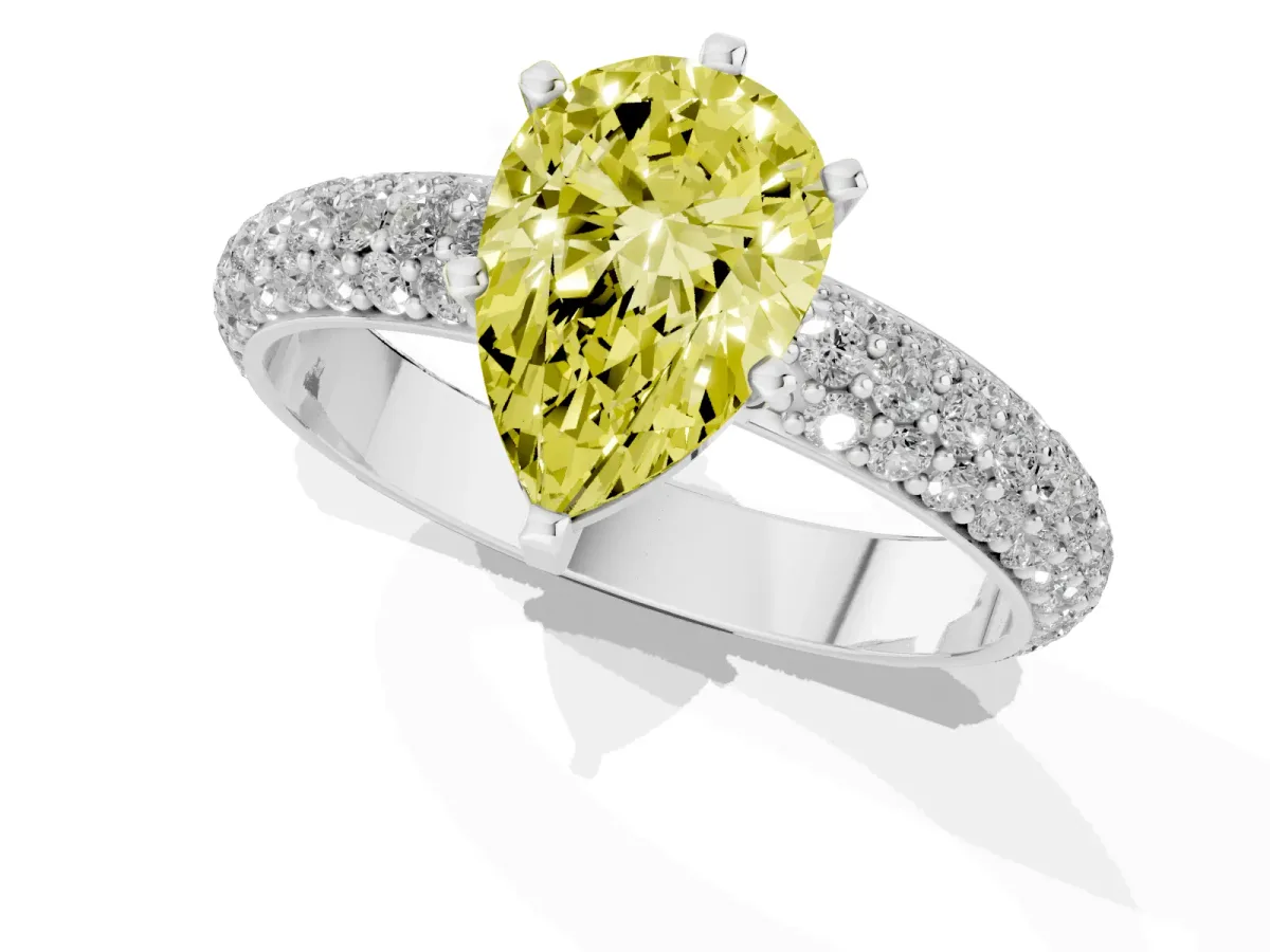 Fancy Yellow Pear Cut Diamond Solitaire Ring with Prong Setting and Pavé Band Silver