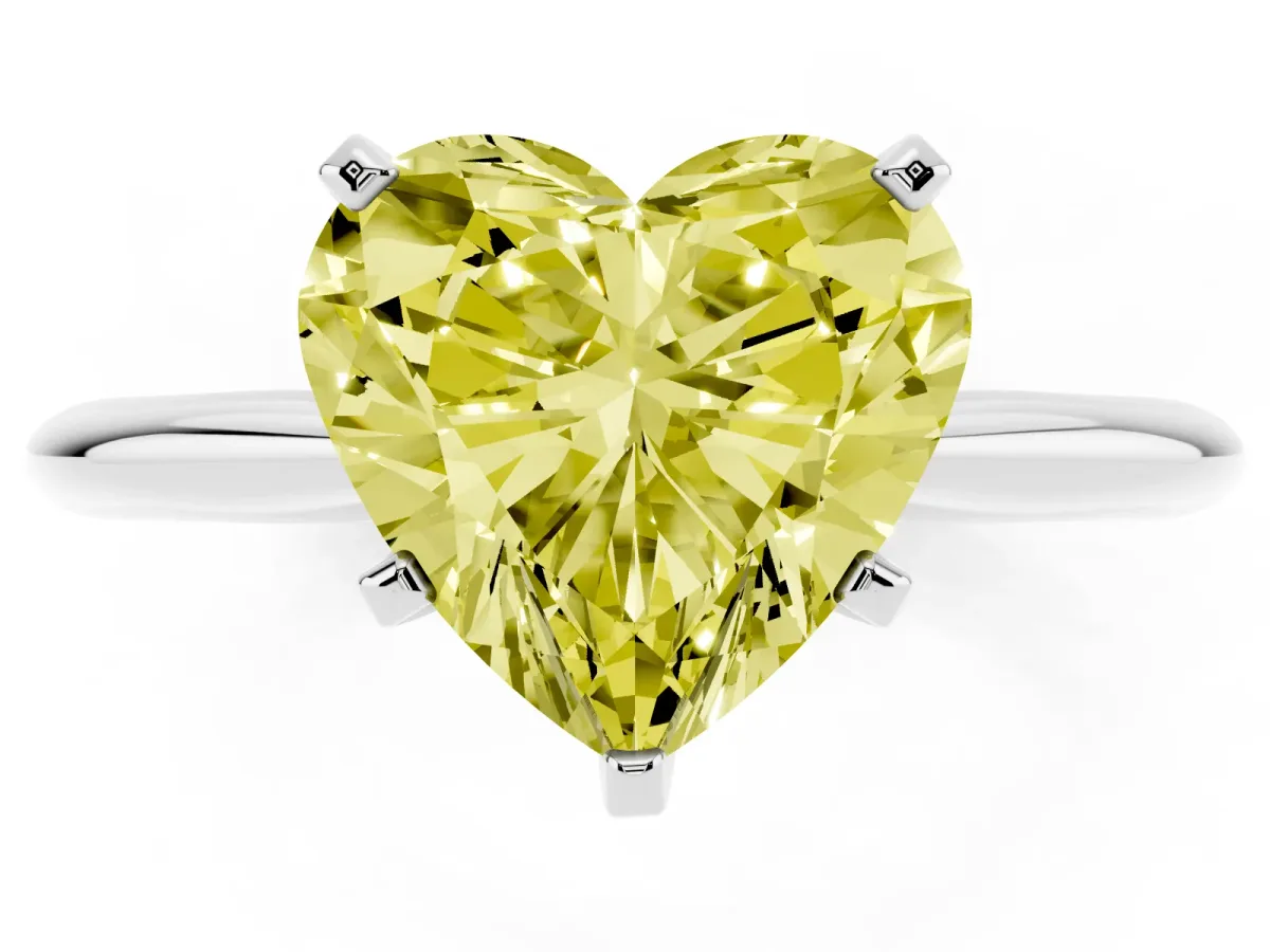 Fancy Yellow Heart Cut Cut Solitaire Ring with Four-Prong Setting on a Classic Band Silver