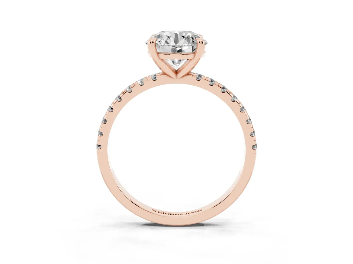Round Cut Diamond Brilliant Solitaire Ring with Pavé Band and Four-Prong Setting Rose gold