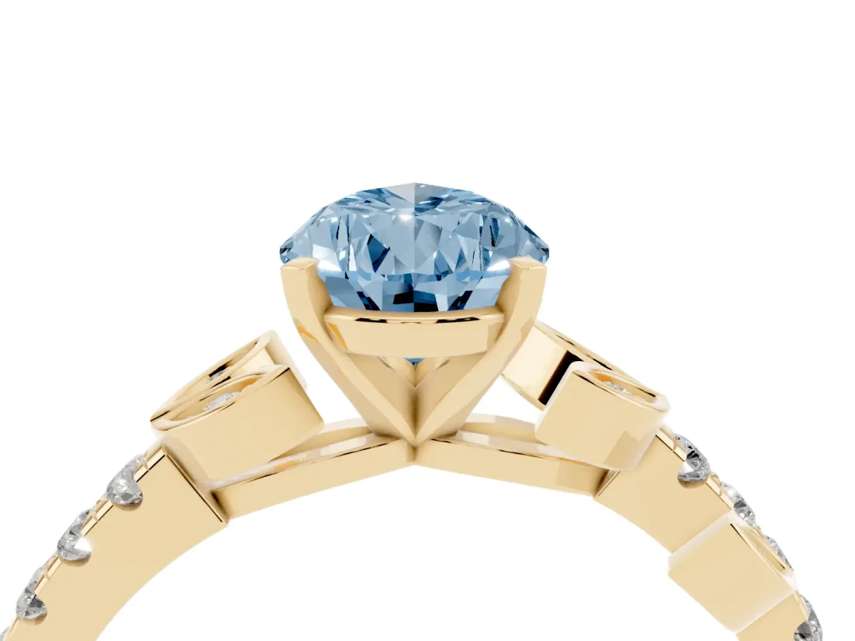 Fancy Blue Pear Cut Solitaire Leaf-Inspired Diamond Ring with Pavé Band and Four-Prong Setting Yellow gold