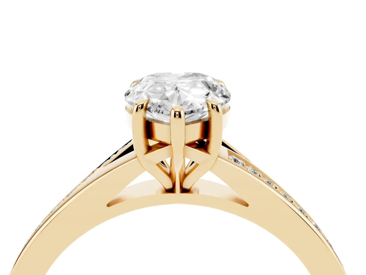 Pear Cut Diamond Solitaire Ring with Pavé Band and Prong Setting Yellow gold