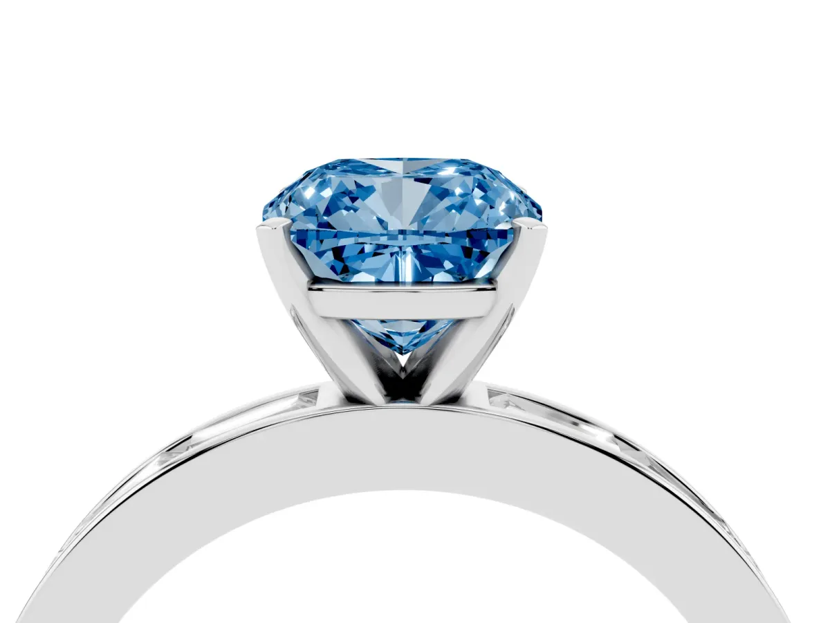 Fancy Blue Cushion Cut Solitaire Diamond Ring with Channel-Set Baguette Band and Four-Prong Setting Platinum