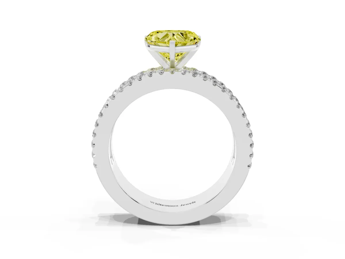 Fancy Yellow Heart Cut Diamond Solitaire Ring with Pavé and Channel Set Band Platinum