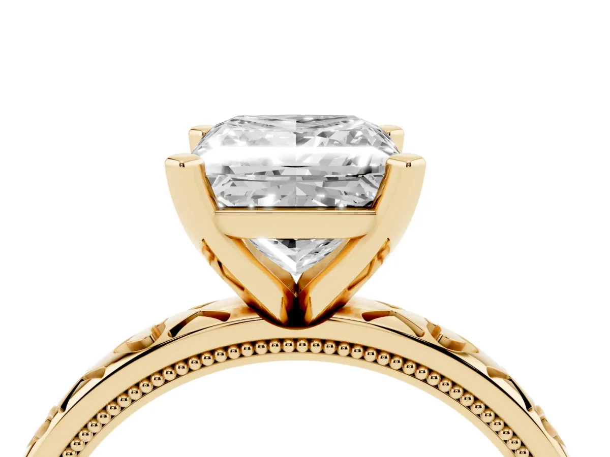 Princess Cut Solitaire Diamond Engagement Ring with XO Engraved Band and Four-Prong Setting Yellow gold