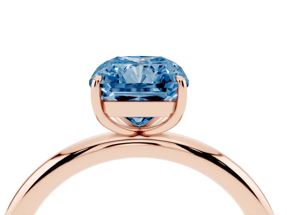 Fancy Blue Radiant Cut Solitaire Diamond Ring with Four-Prong Setting on a Plain Band Rose gold