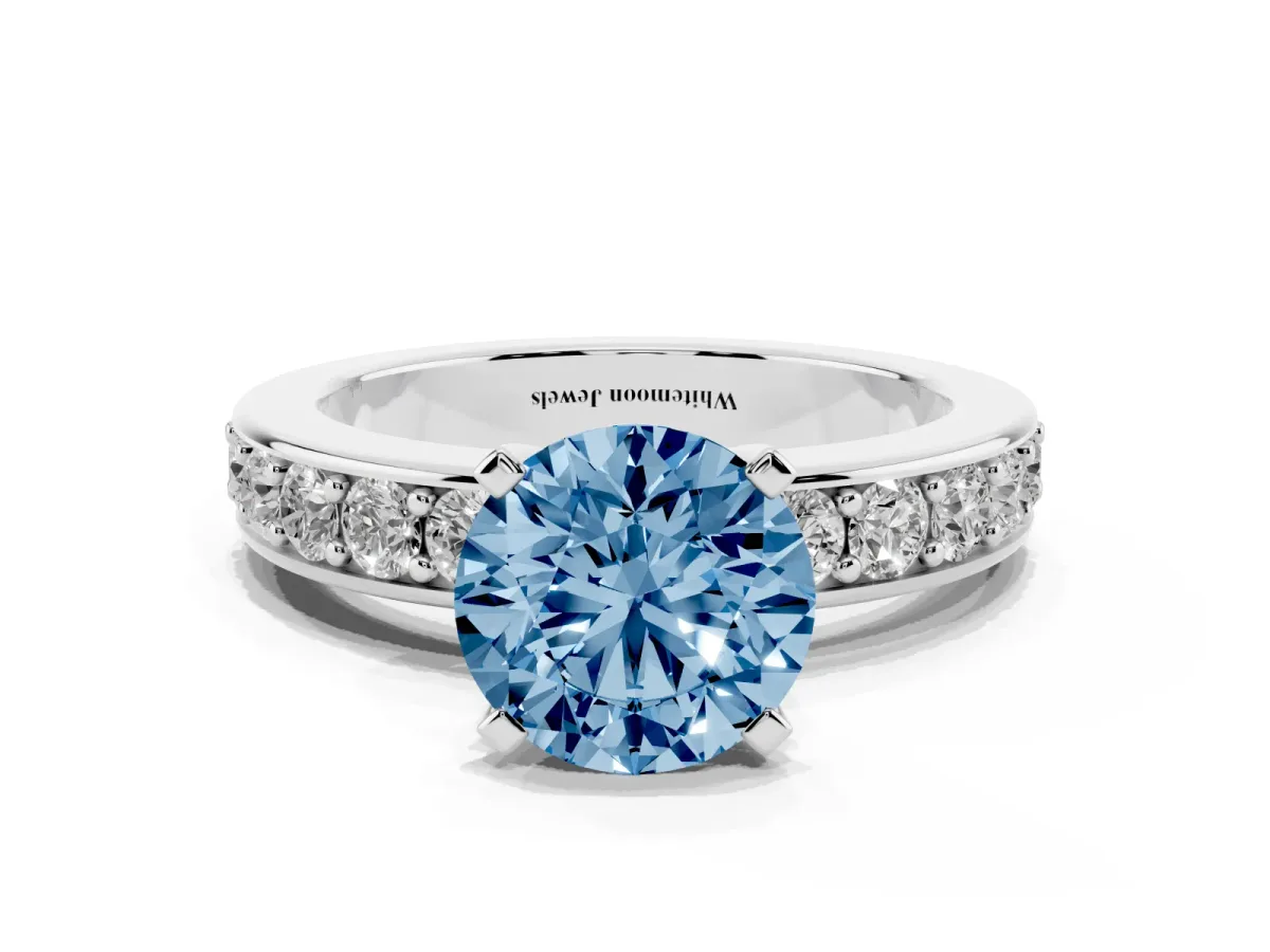 Fancy Blue Round Cut Diamond Engagement Ring with Channel Set Round Band and Prong Setting White gold