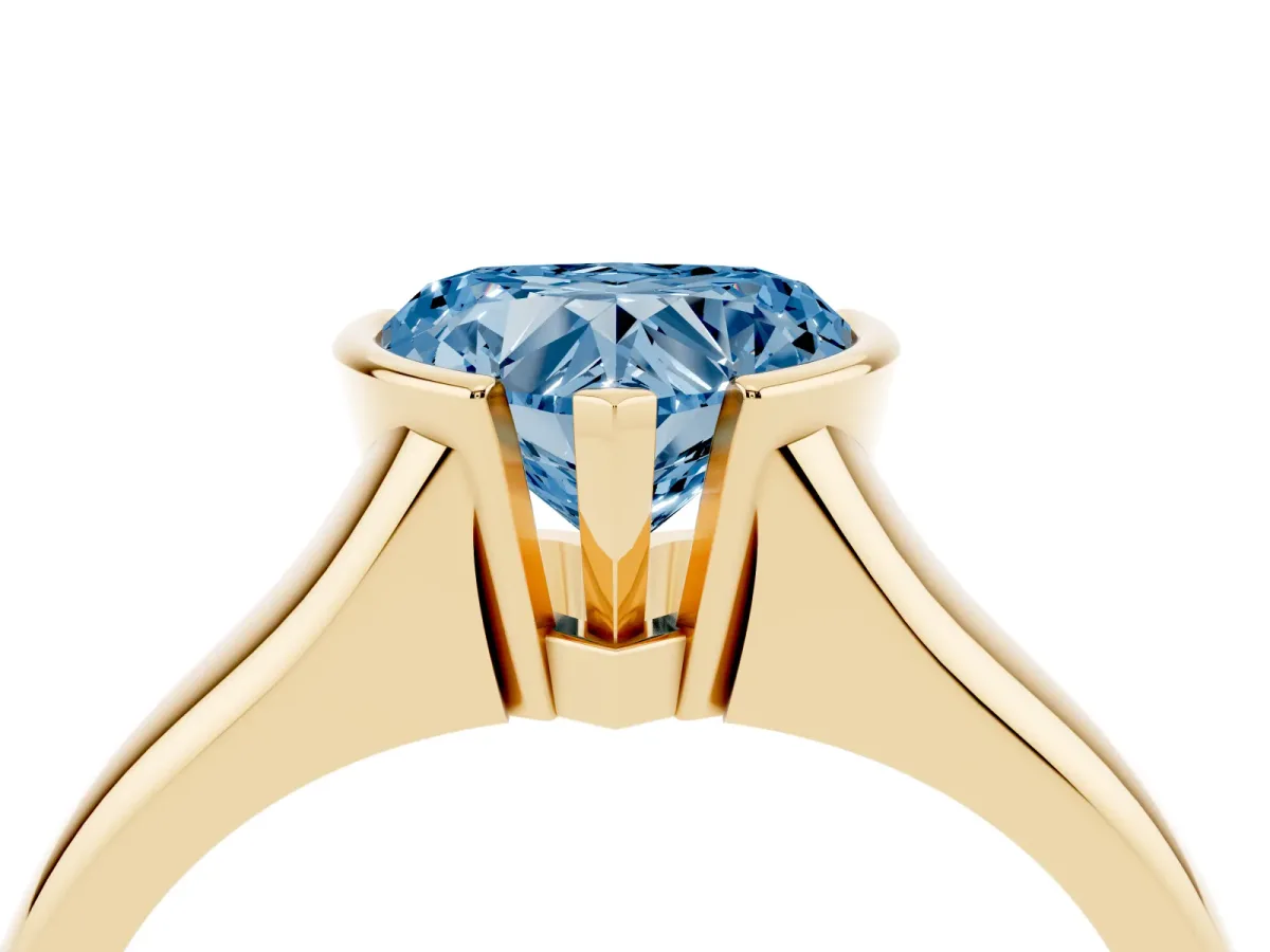 Fancy Blue Heart Cut Solitaire Tension Set Diamond Ring with Split Shank Band Yellow gold