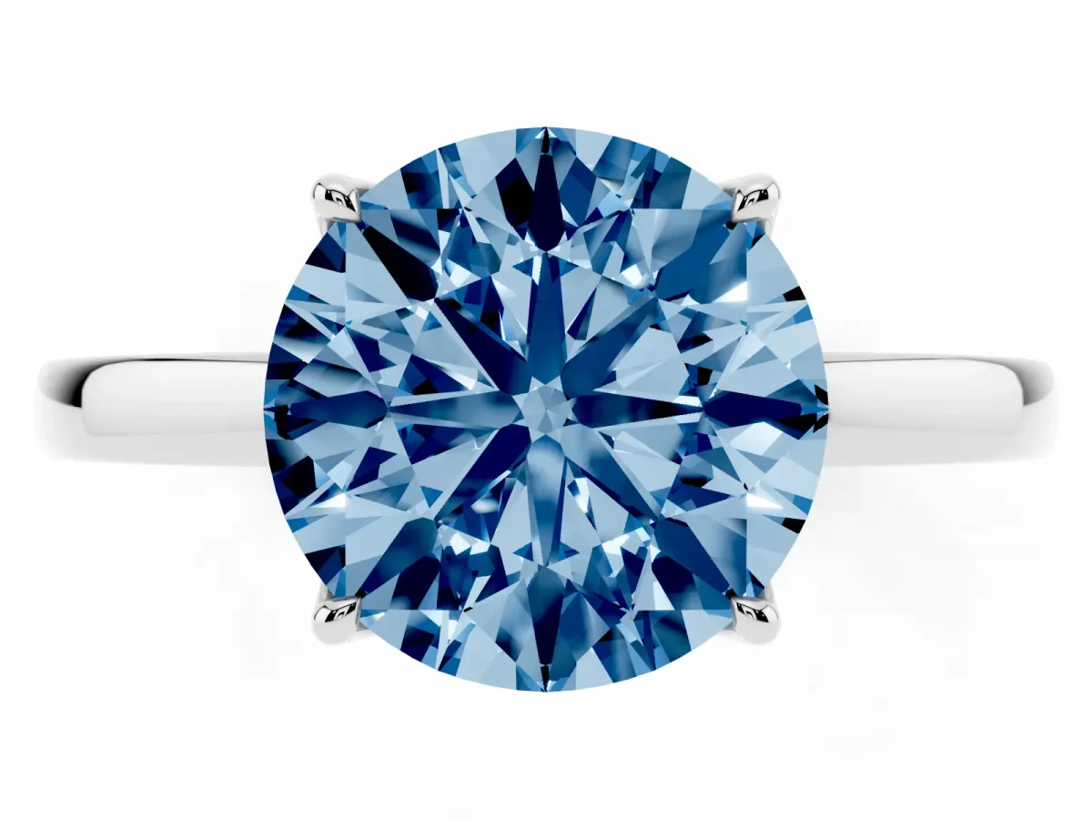 Fancy Blue Round Cut Diamond Solitaire Ring with Thin Band and Prong Setting Silver
