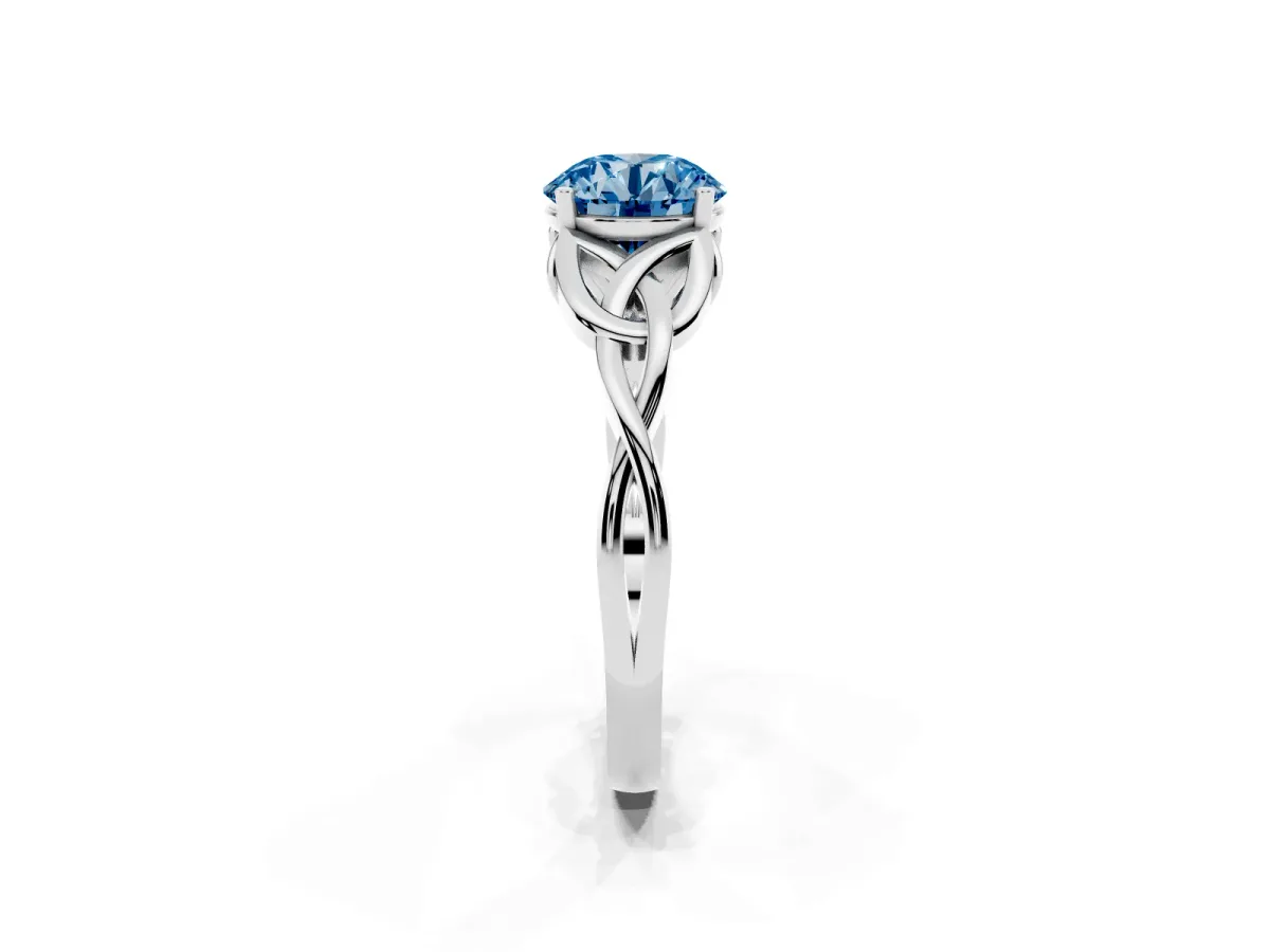Fancy Blue Round Cut Diamond Solitaire Engagement Ring with Celtic Knot Band and Four-Prong Setting Silver