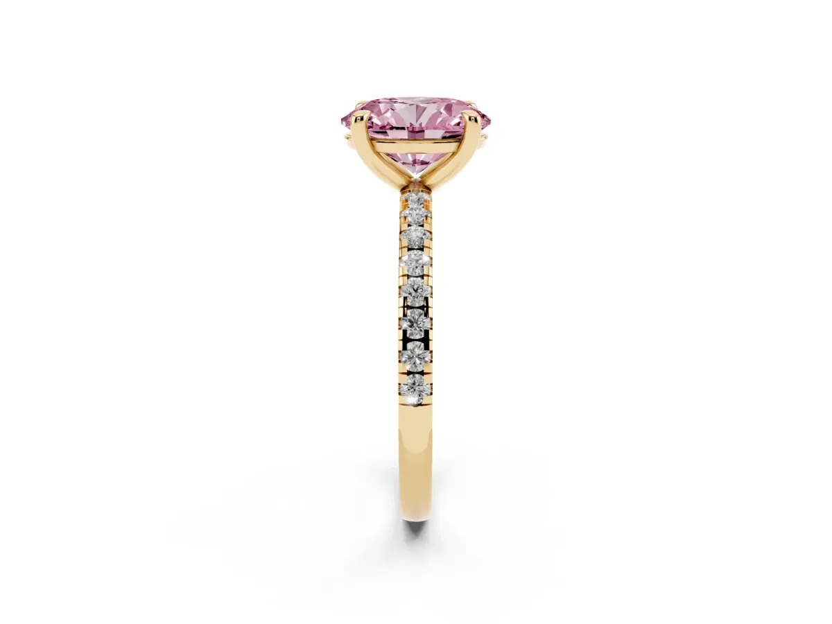 Fancy Pink Oval Cut Diamond Brilliant Solitaire Ring with Pavé Band and Four-Prong Setting Yellow gold