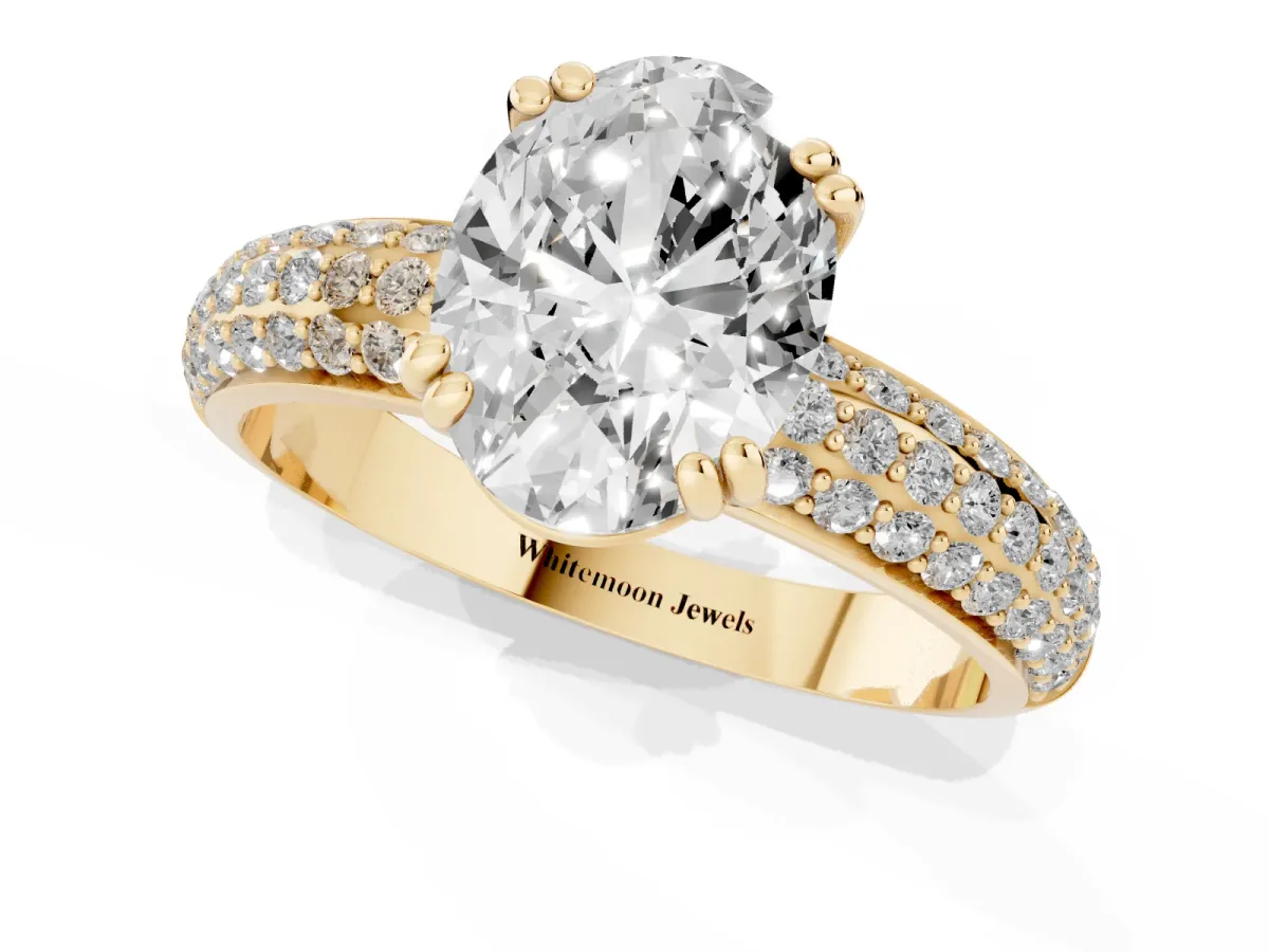 Oval Cut Diamond Solitaire Ring with Multi-Row Round Pavé Band and Prong Setting Yellow gold