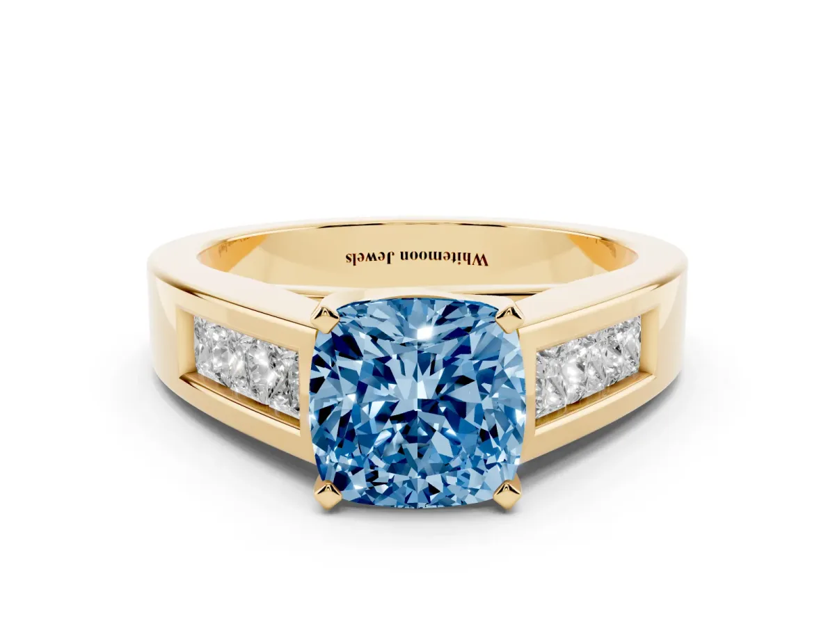Fancy Blue Cushion Cut Cut Channel Set Solitaire Ring with Four-Prong Setting Yellow gold