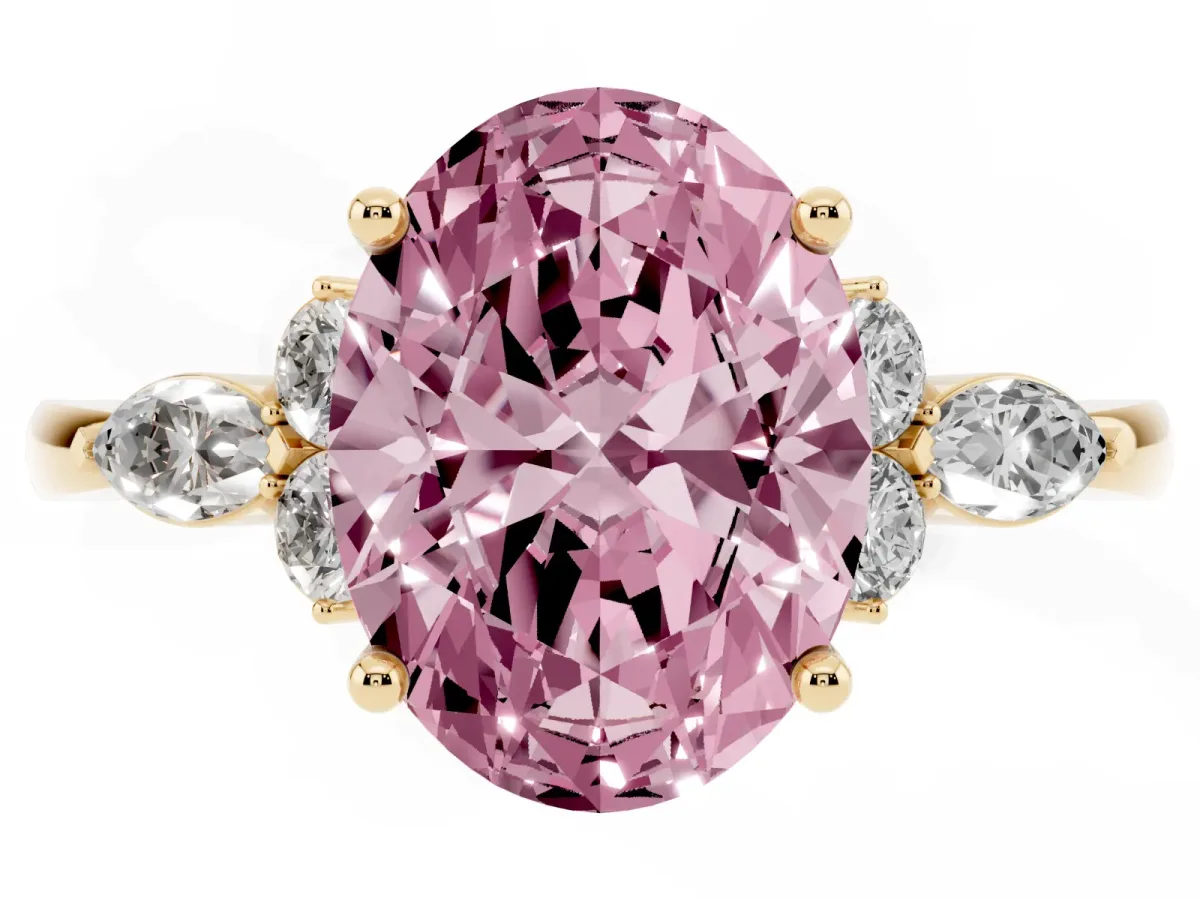 Fancy Pink Oval Cut Brilliant Diamond Solitaire Ring with Pear Side Stones and Four-Prong Setting Yellow gold