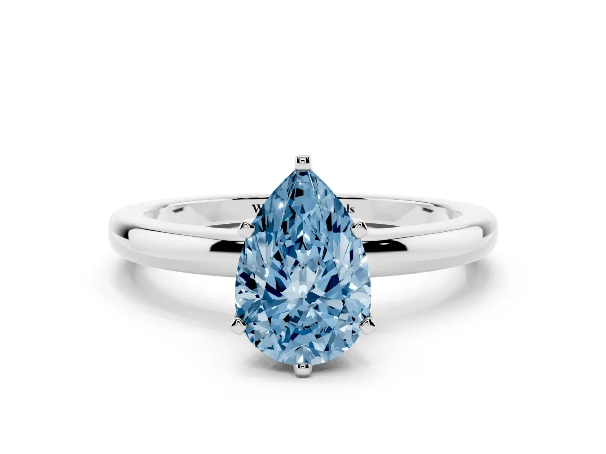Fancy Blue Pear Cut Solitaire Diamond Ring with Six-Prong Setting on a Classic Band Platinum