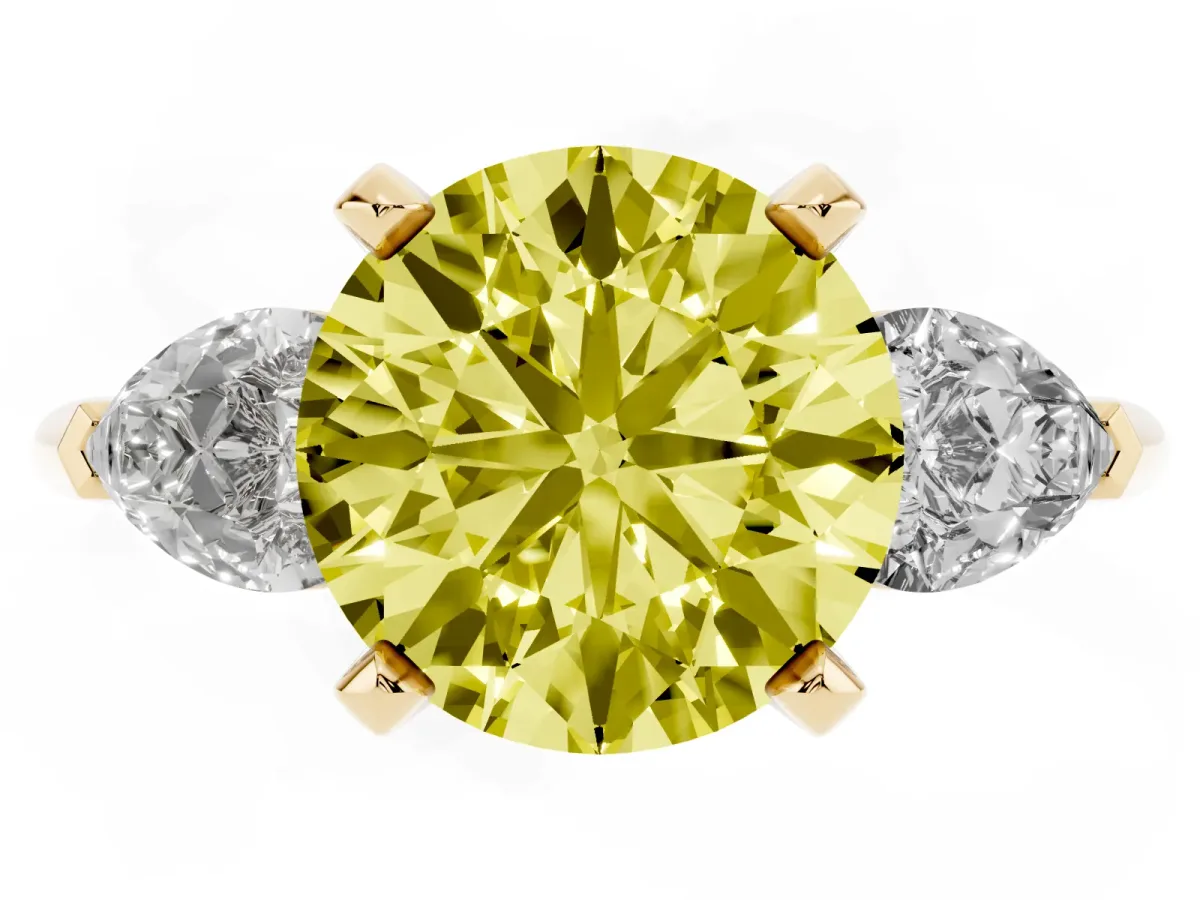 Fancy Yellow Three-Stone Round Cut Diamond Ring with Pear Side Stones and Four-Prong Setting Yellow gold