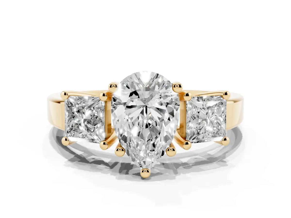 Three-Stone Pear Cut Cut Solitaire Ring with Prong Setting Yellow gold