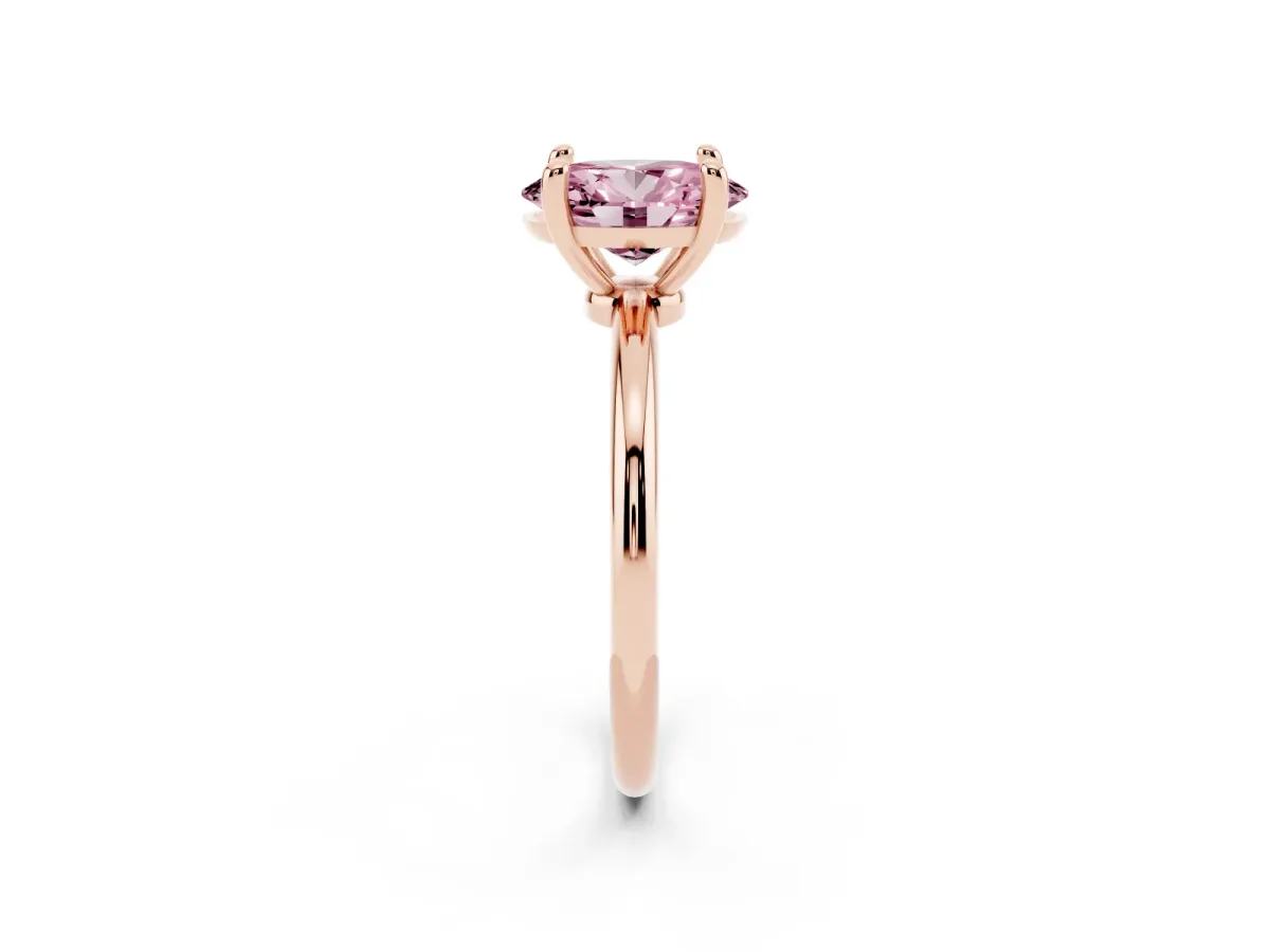 Fancy Pink Oval Cut Solitaire Diamond Ring with 4-Prong Setting on a Classic Band Rose gold