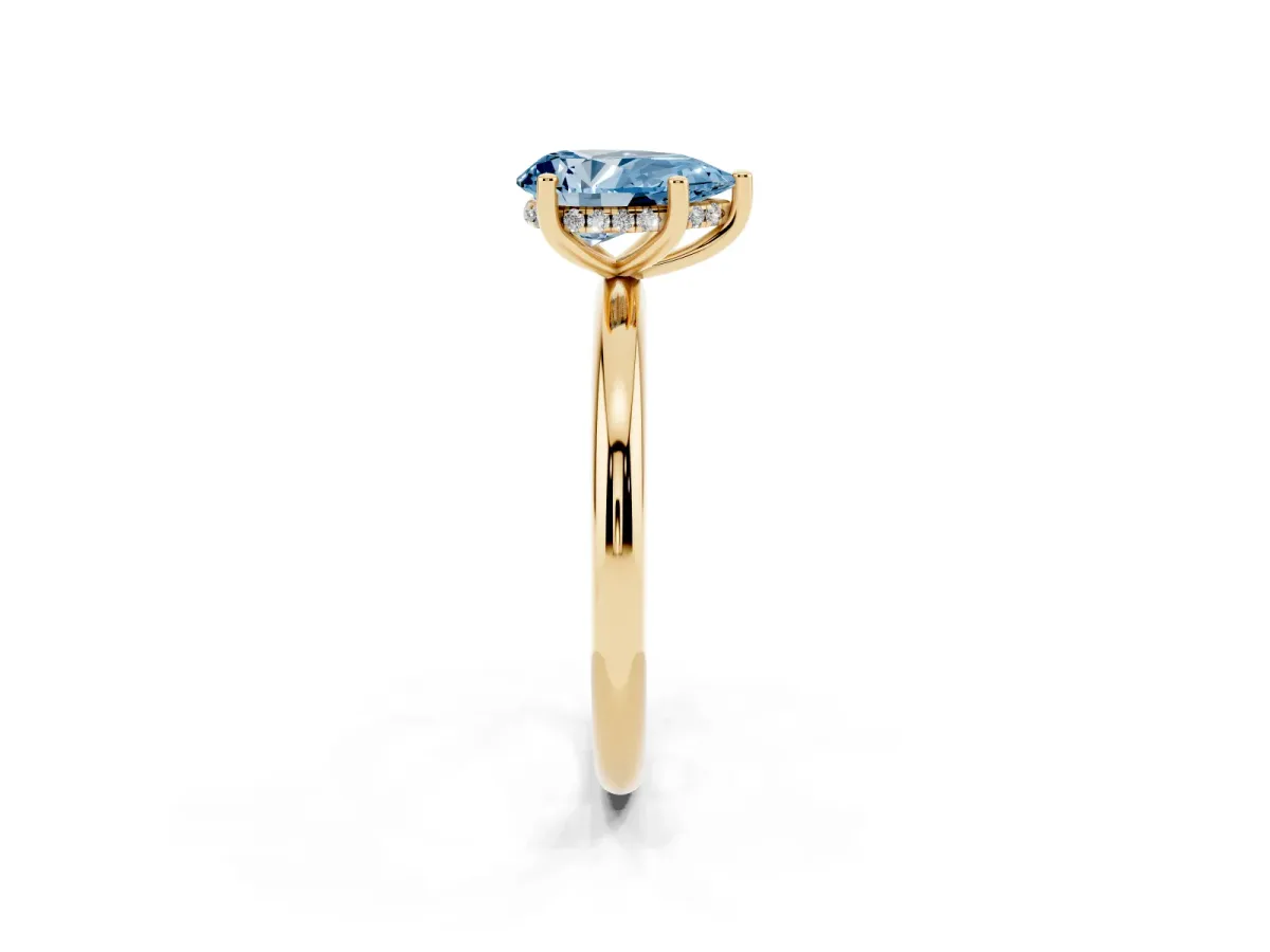 Fancy Blue Pear Cut Cut Solitaire Engagement Ring with Four-Prong Setting and Classic Band Yellow gold
