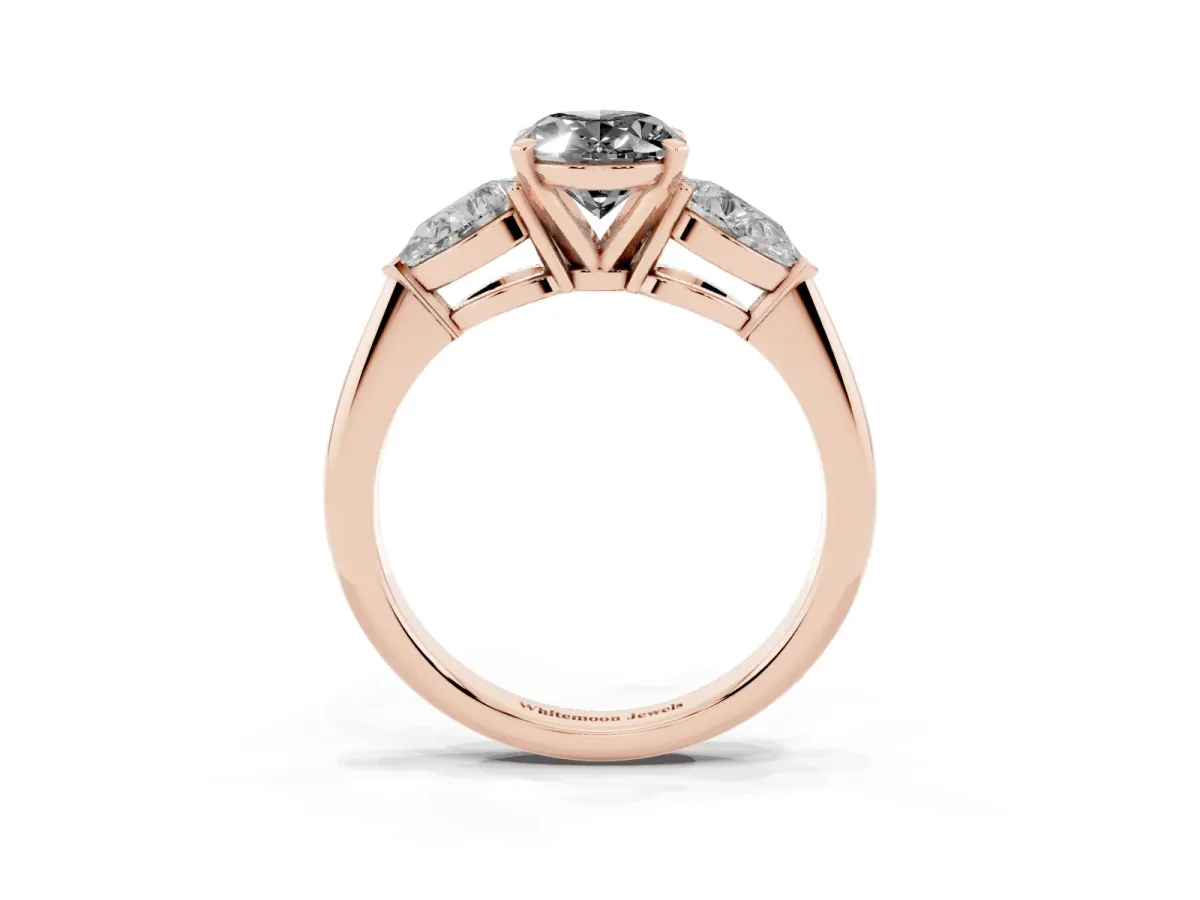 Fancy Black Three-Stone Oval Cut Diamond Ring with Pear Side Stones and Four-Prong Setting Rose gold
