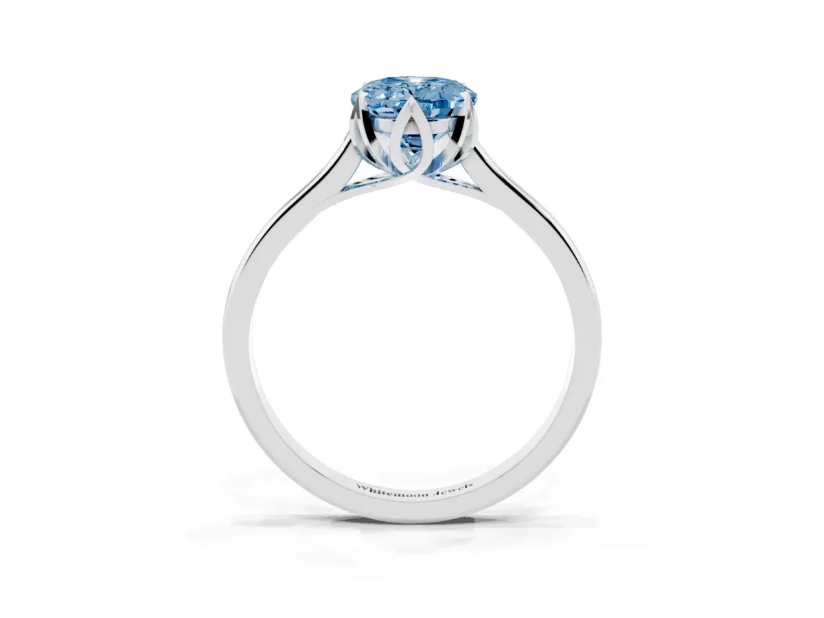 Fancy Blue Oval Cut Diamond Solitaire Ring with Flower Prong Setting and Classic Band Silver