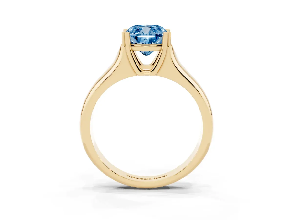 Fancy Blue Cushion Cut Diamond Solitaire Ring with Wide Band and Prong Setting Yellow gold