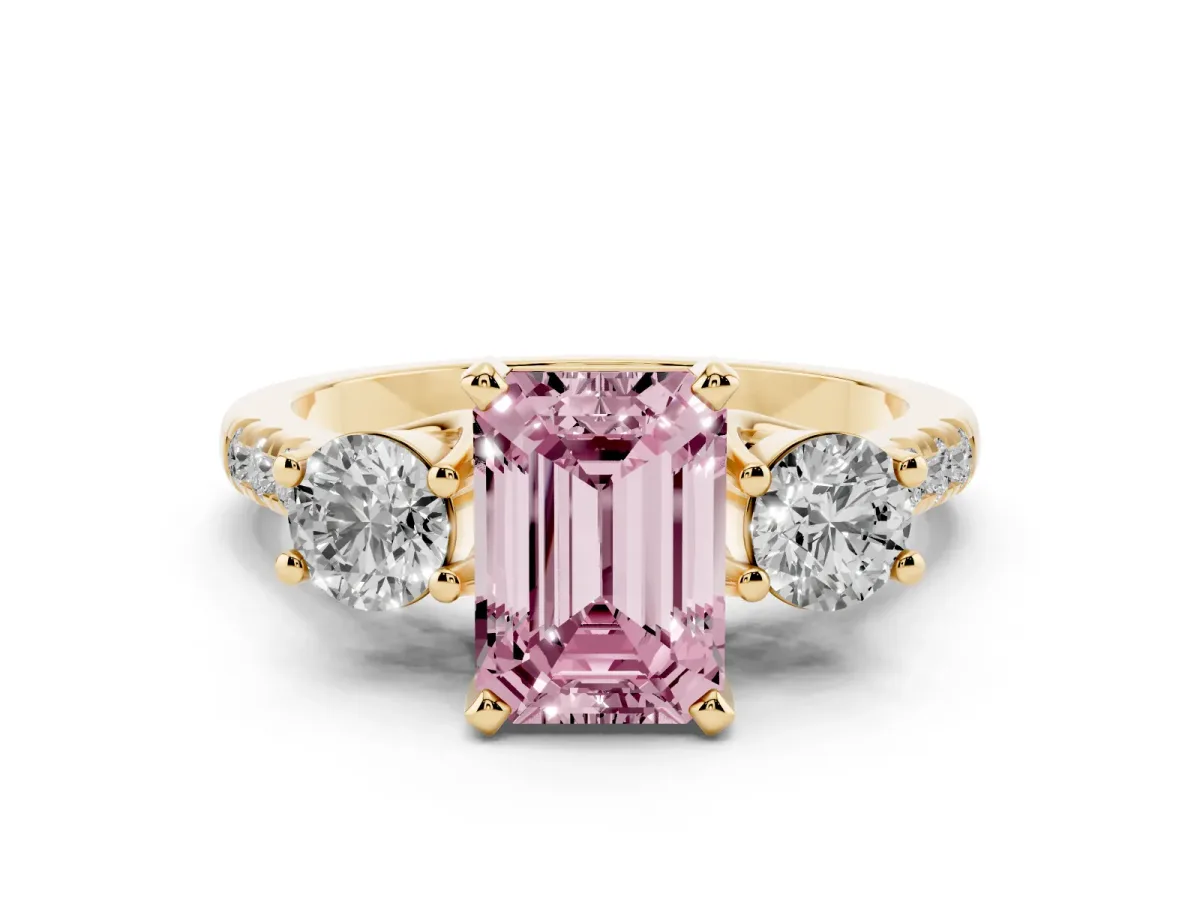 Fancy Pink Three-Stone Emerald Cut Diamond Pavé Band with Four-Prong Setting Yellow gold