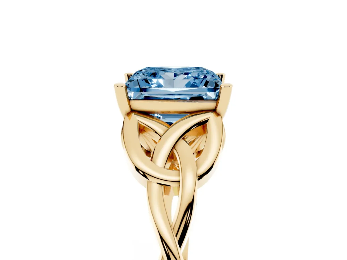 Fancy Blue Princess Cut Diamond Solitaire Engagement Ring with Celtic Knot Band and Four-Prong Setting Yellow gold