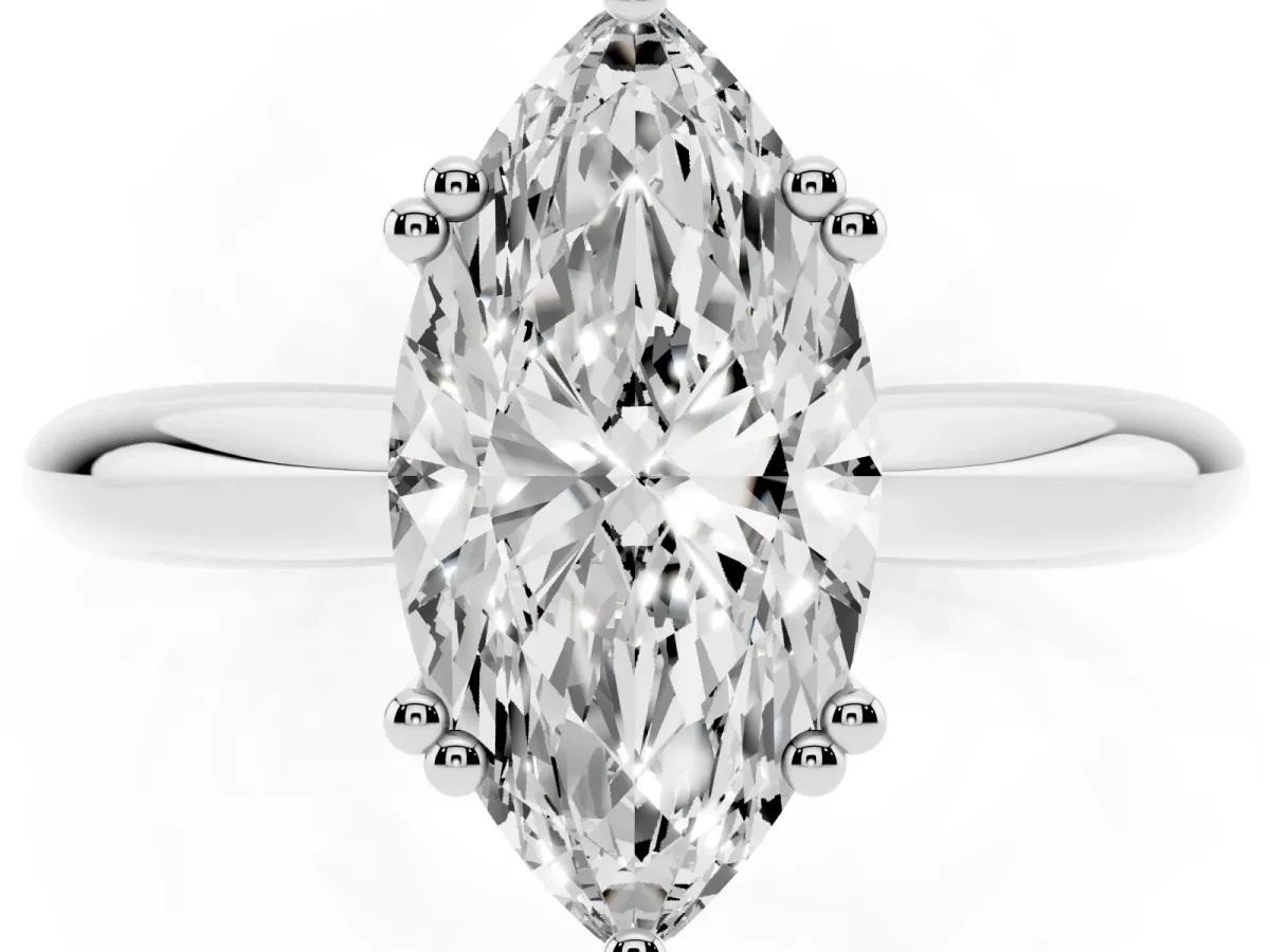 Marquise Cut Cut Solitaire Engagement Ring with Tapered Band and Four-Prong Setting White gold