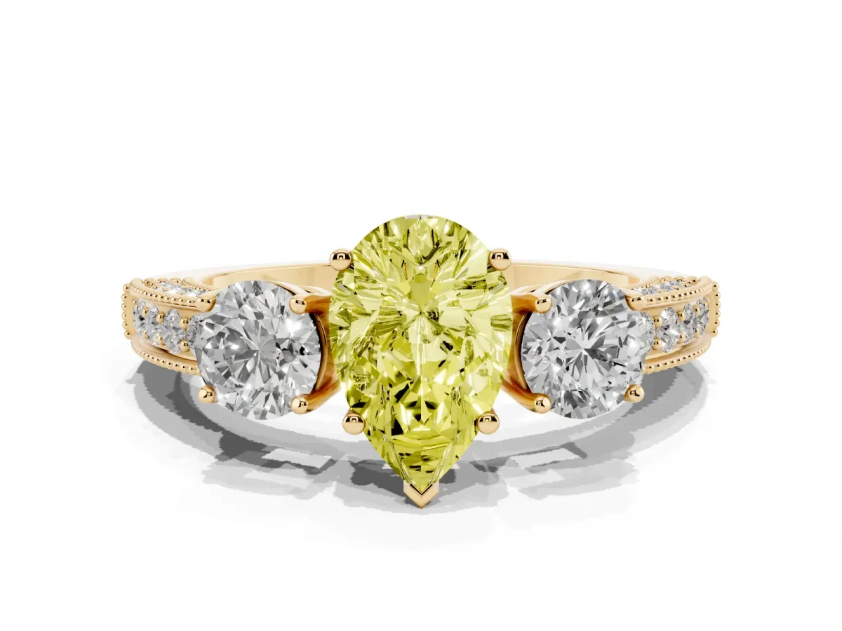 Fancy Yellow Pear Cut Three-Stone Diamond Ring with Pavé Band and Four-Prong Setting Yellow gold