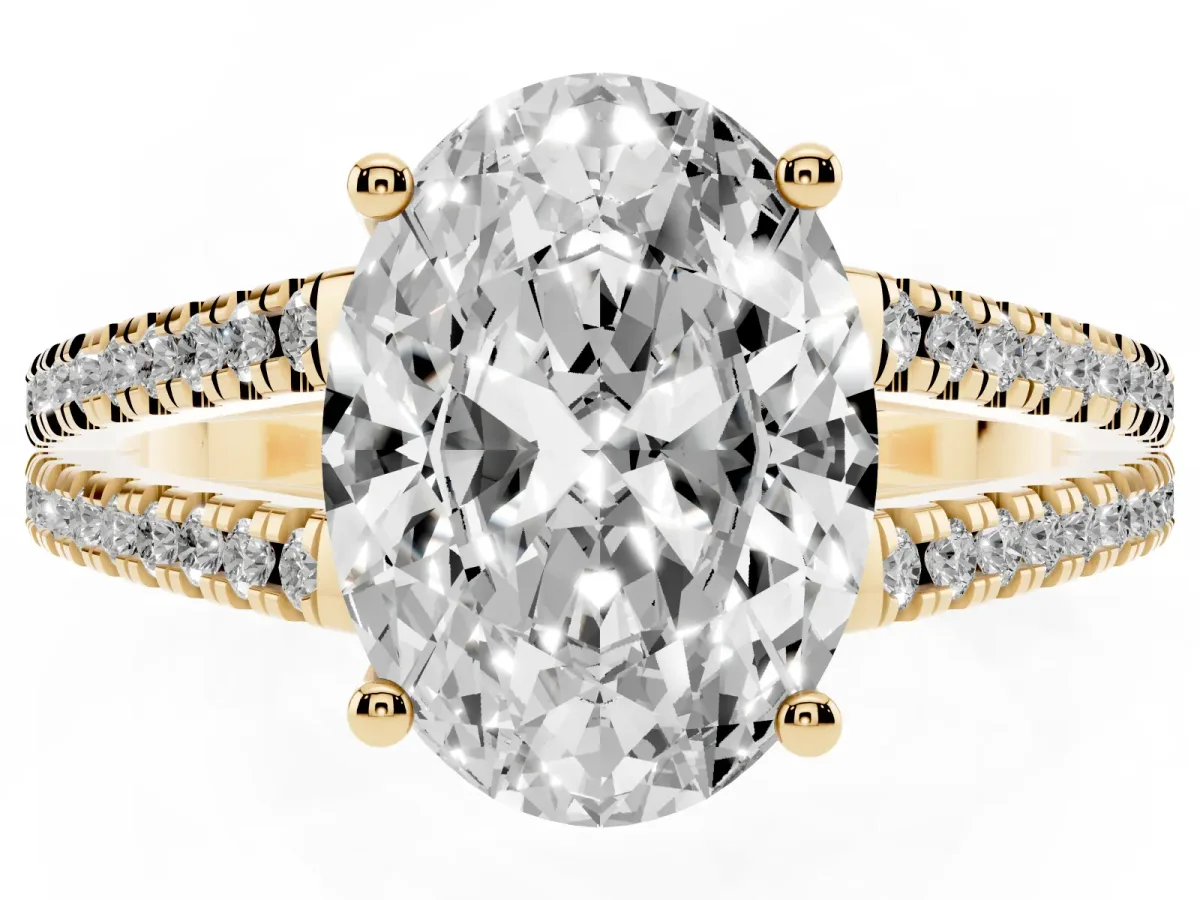 Oval Cut Diamond Solitaire Engagement Ring with Split Shank Pavé Band Yellow gold