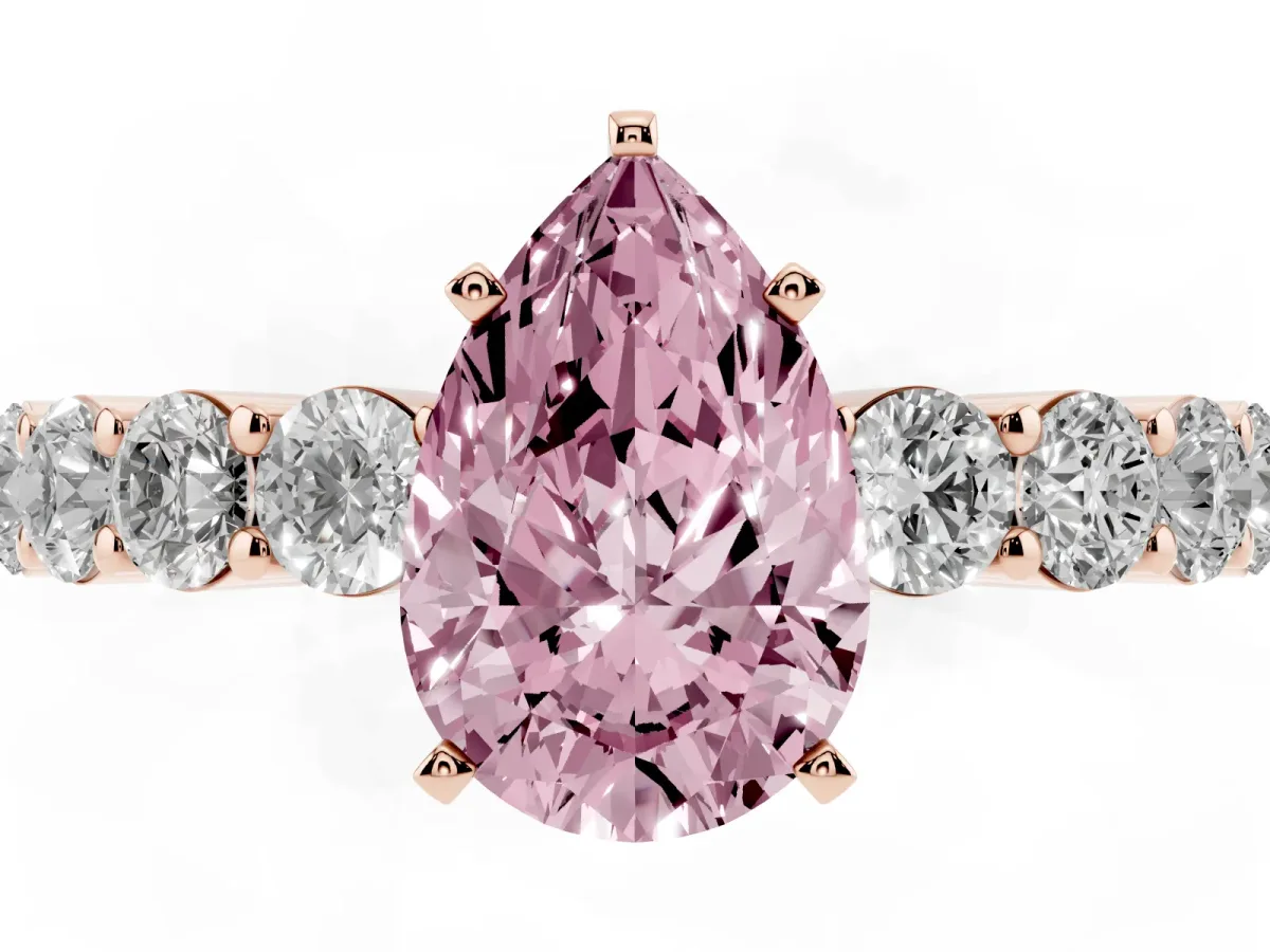 Fancy Pink Pear Cut Diamond Solitaire Ring with Shared Prong Round Side Stones Rose gold