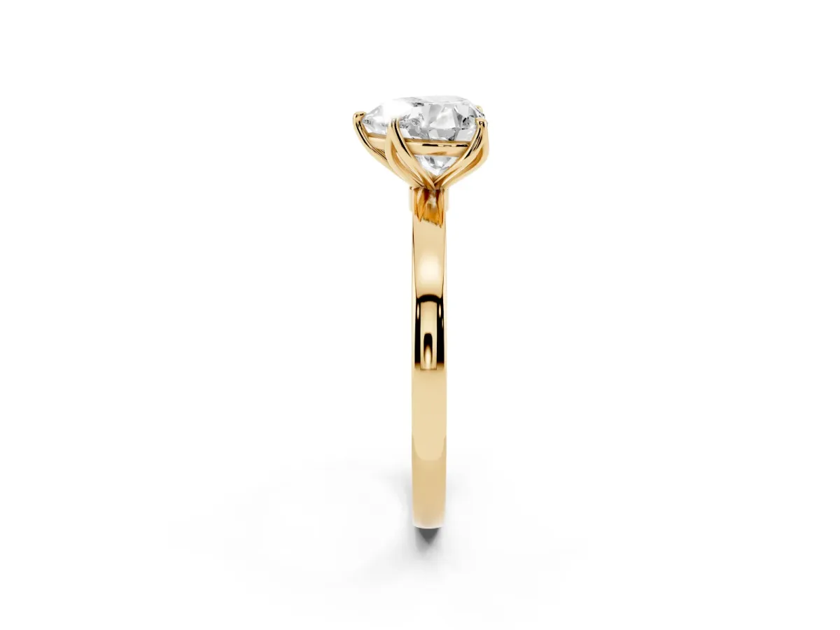 Heart Cut Diamond Solitaire Ring with Thin Band and Prong Setting Yellow gold